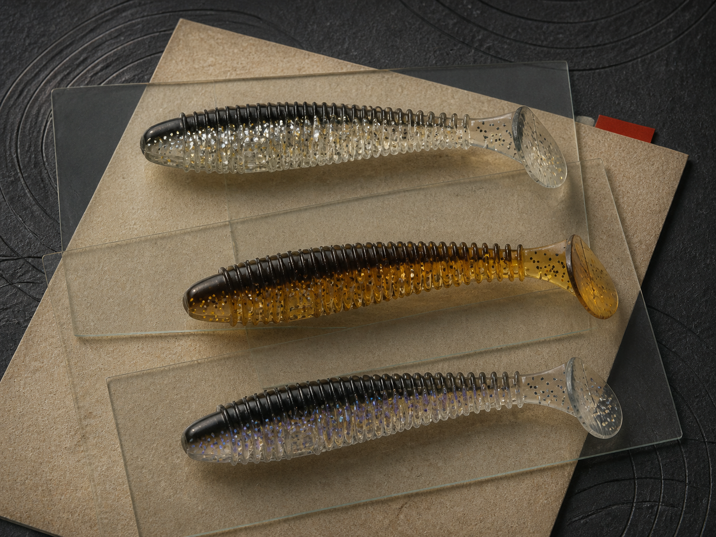 Soft bait material study arranged as an archival field plate